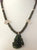 Moldavite necklace with carved Moldavite Buddha
